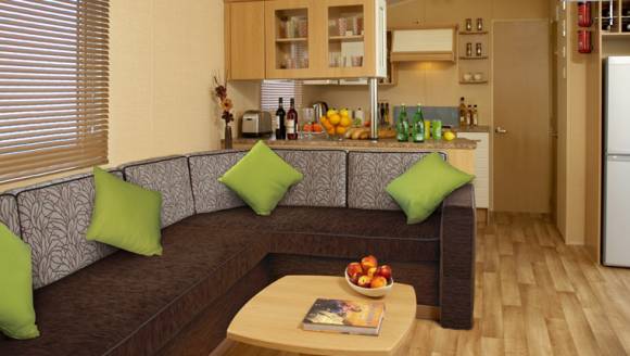 Lounge and kitchen inside a Willerby holiday home, from the original website